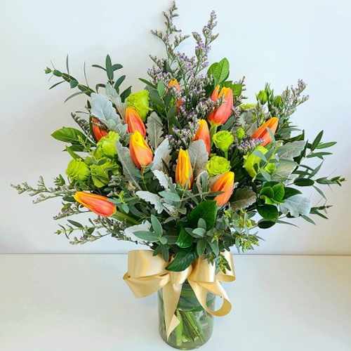 10 Orange Tulip In A Glass Vase