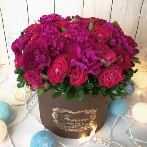 Carnation And Rose In A Round Box