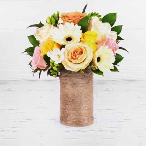 Mixed Rose Gerbera And Fressia In A Vase