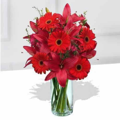 Red Gerberas And Lilies In Vase