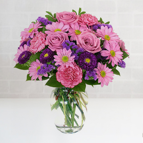 Blended Pink Rose Gerberas and Carnations in a Glass Vase